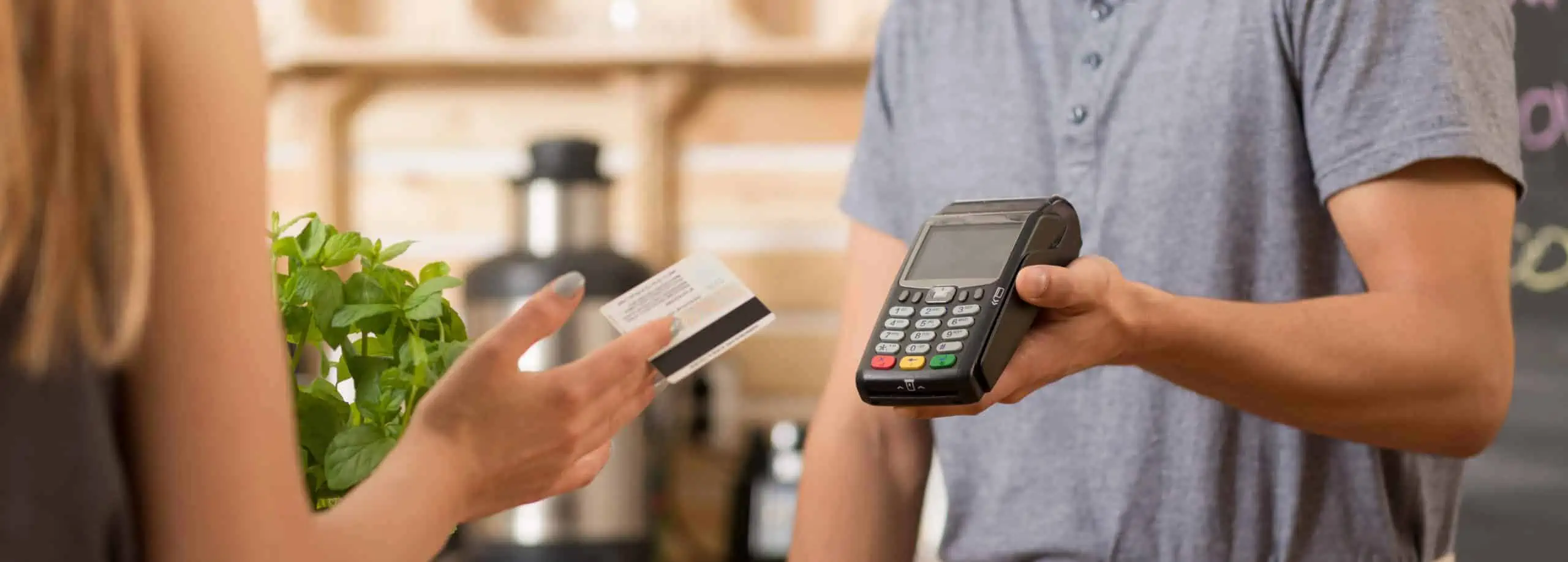Small business customer paying with debit card