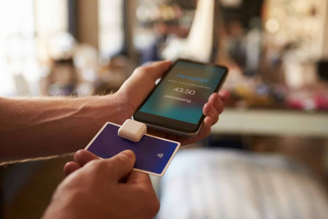 credit card payment app attached to mobile phone 67534402
